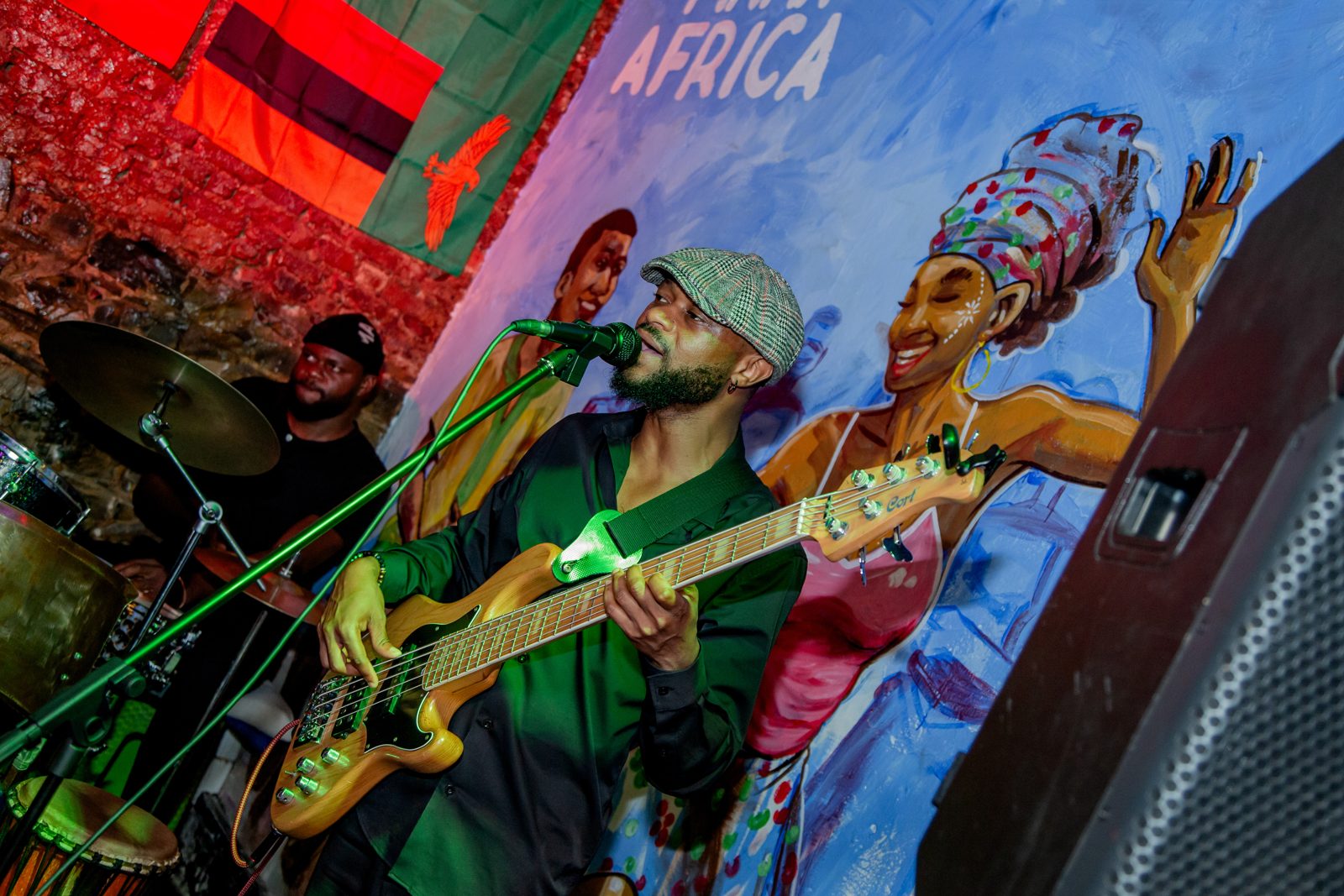 Guitarist and singer performing at Mama Africa